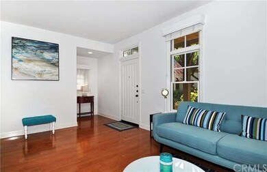 Elegant hard wood flooring graces this luxury home