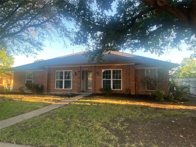 Single story home with a front yard