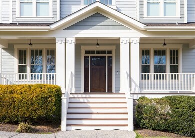 Property entrance featuring covered porch