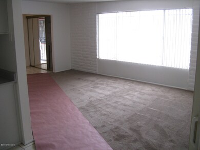 Living room looking back to front door