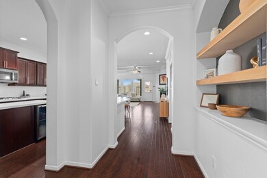 Grand first impression! The entryway greets you with high ceilings, natural light, and that ‘wow’ factor.