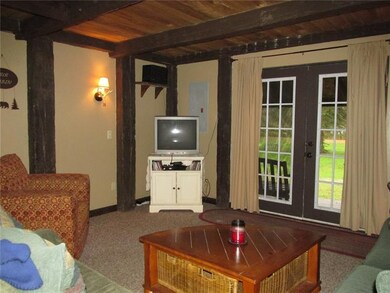 Other side of the living room. The door opens out 
