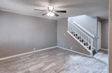 ANOTHER VIEW OF THE LIVING ROOM