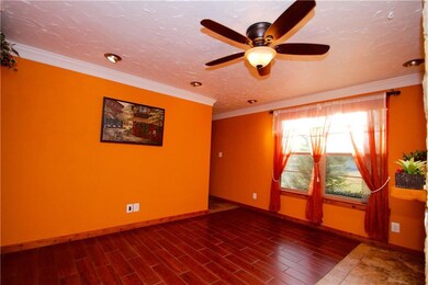 Living Room with View of Picture Window To Greenbe