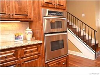 Granite countertops coordinate well with the backs