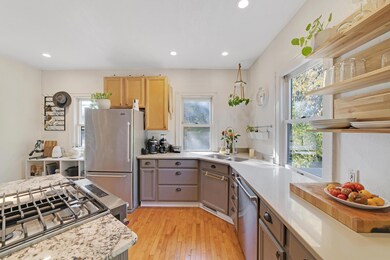 Kitchen was completely gutted, and an island installed with new cabinets.