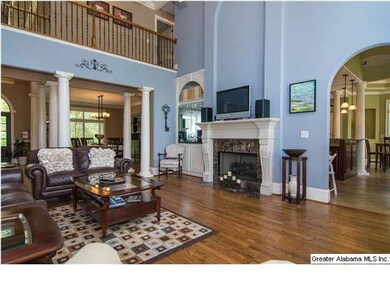 Off the foyer and dining room is the 2 story famil