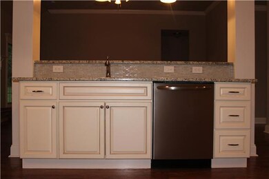 Notice the upgraded fixtures and SS dishwasher!
