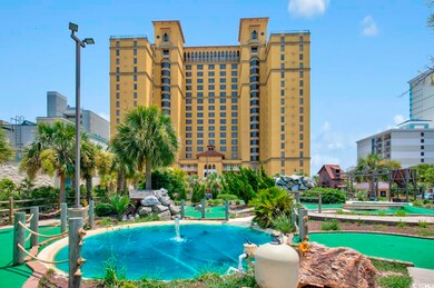 View of pool featuring pool water feature