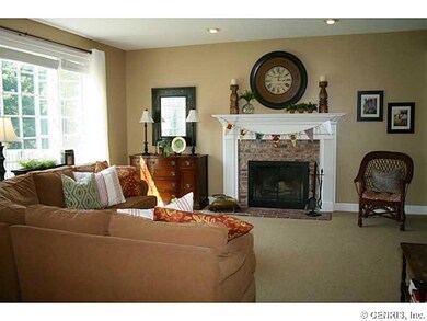 Family Room. Wood burning fireplace with heatilato