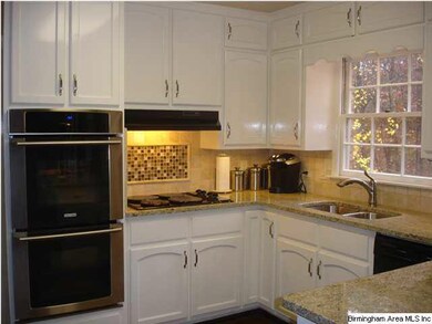 Updated Cabinets, Granite Countertops and  Tile Ba
