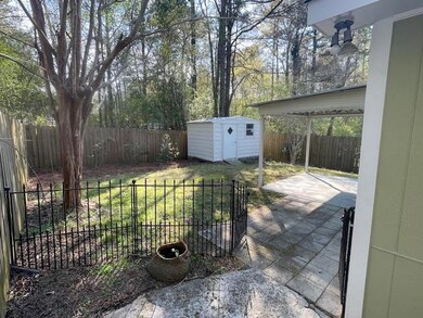 BACKYARD W/ COVERED PATIO