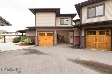 Two-car attached garage with extra storage space.