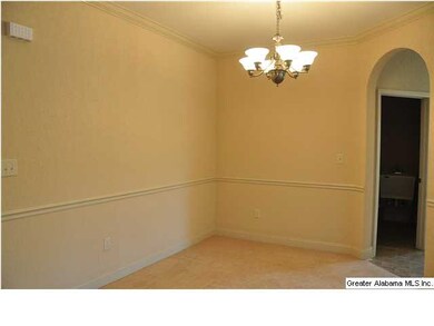 Formal Dining area with chair rail and elegant lig