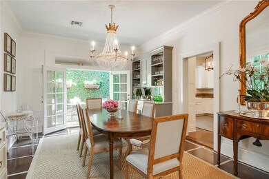 Custom Bar With Wine Cooler and French Doors Openi