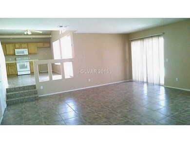 Family Room. FAMILY ROOM TOWARDS KITCHEN.