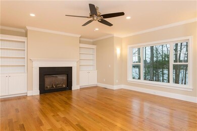 The living area features custom...