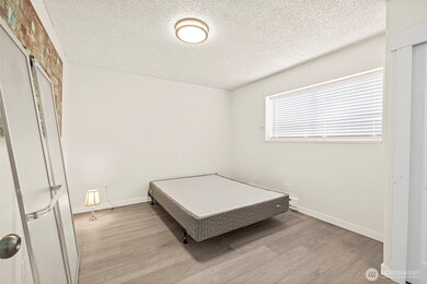 Bedroom #1.  New flooring throughout each unit.