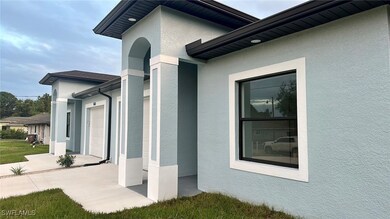 View of property exterior with a garage