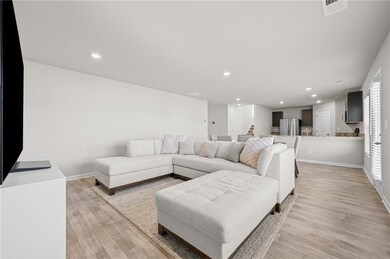 Living room featuring light wood style flooring