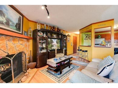 The livingroom is large enough to accommodate an e