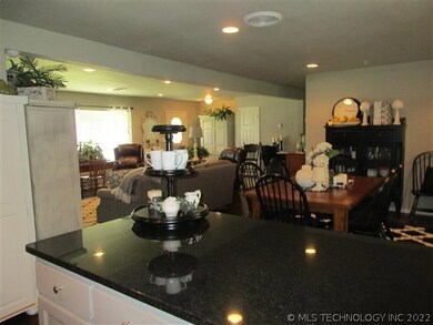 Kitchen With Granite Open To Dining And Living