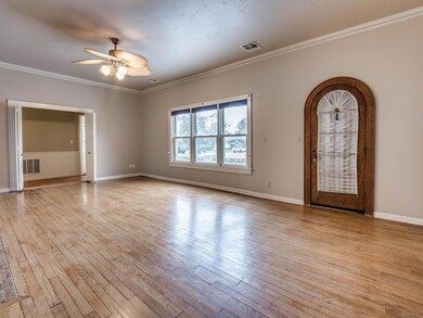 Arched front door inside vestibule