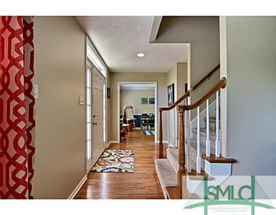 Foyer. Main Living Areas Carry Beautiful Hardwood 