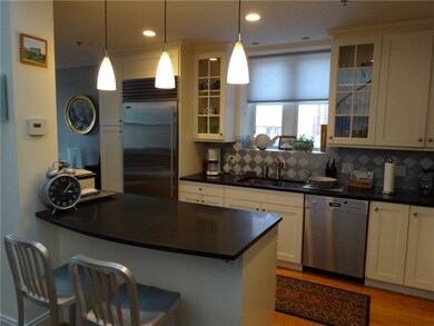 Fabulous White Kitchen with Stone Countertops and
