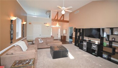 Huge Family room with high ceilings and contempora