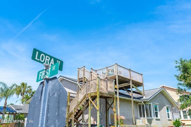Corner of Lora and First