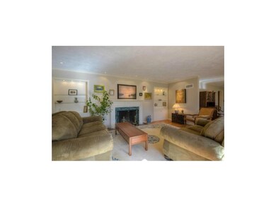 Spacious living room with art gallery lighting and