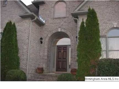 A Very Inviting Covered Arched Entrance with a Bea