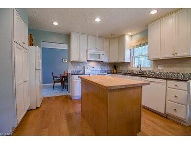 The Kitchen is located off the Dining Room and has