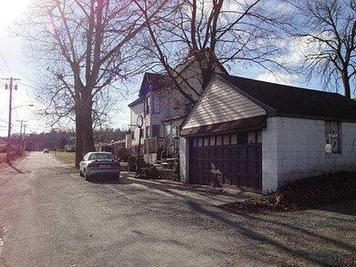 Exterior Front. STREET VIEW 0F SUBJECT PROPERTY IN