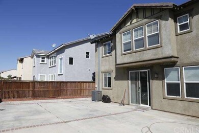 Full cement backyard (with an area for planters in