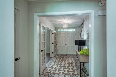 A elegant foyer which now nicely highlights this c