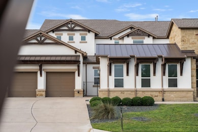 View of front of home with a standing seam roof, 