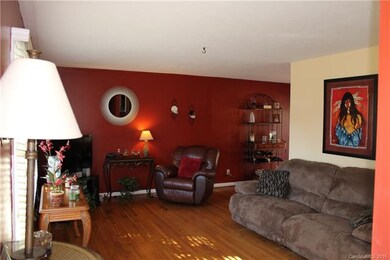 Living room opens into the dining room area