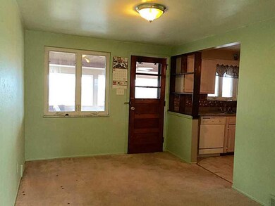 Dining Room. Door leads to sunroom
