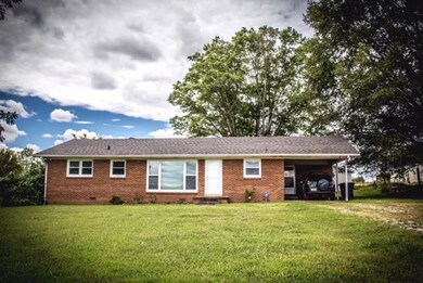 Front of home with carport attached