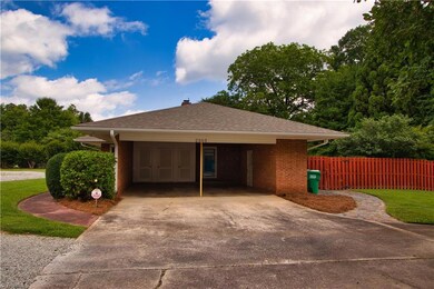 Carport with Storage Room/Work Shop