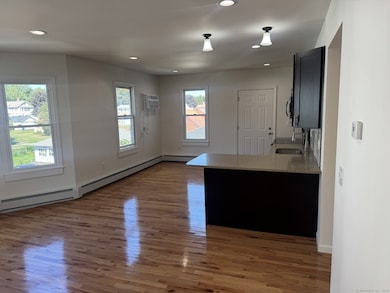 Island and gleaming hardwood floors!
