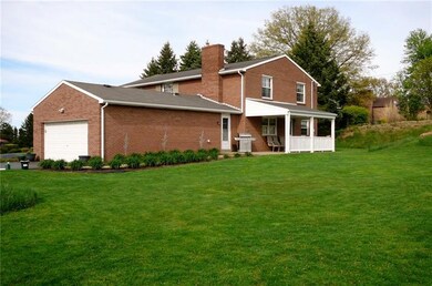 Covered patio and 2 attached garage.