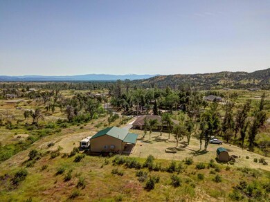 Drone shot back of house and shop lookin