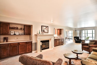 Spectacular Living Room showcases dual bars with c