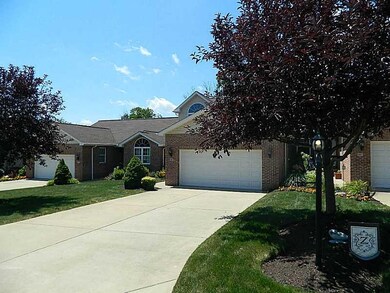 Exterior Front. Cement Drive to 2 Car Garage