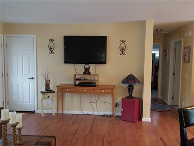 Spacious living room offers 18' x...