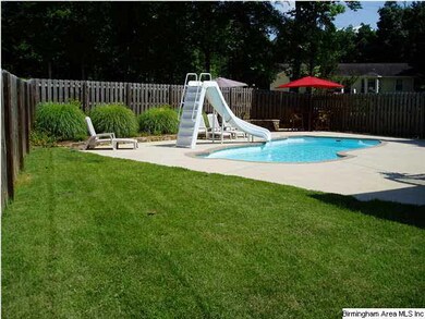 great fenced back yard with inground pool