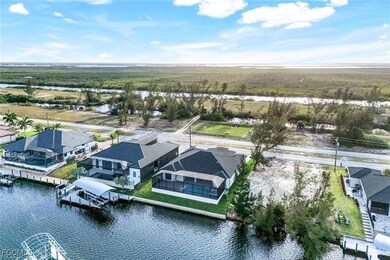 Aerial view of residential area with a nearby body of water